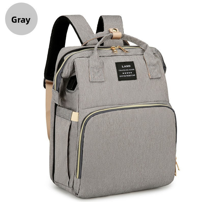 CuddleCloud™ 
Foldable Diaper Bag Backpack